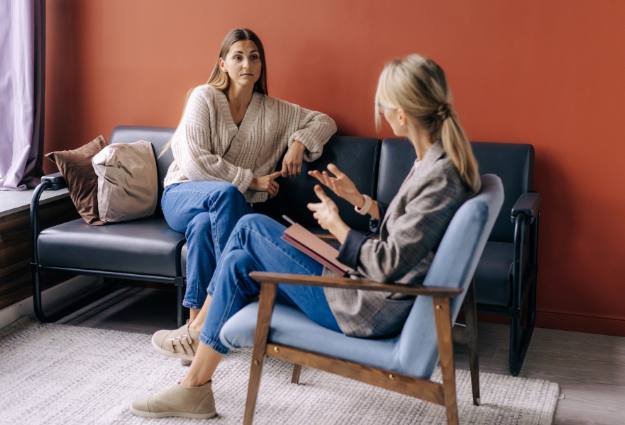 therpist talking to woman