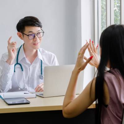 psychiatrist speaking to woman