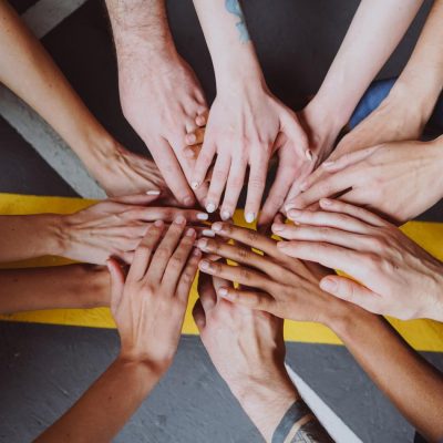 group hands together