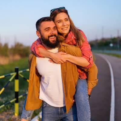 woman on mans back